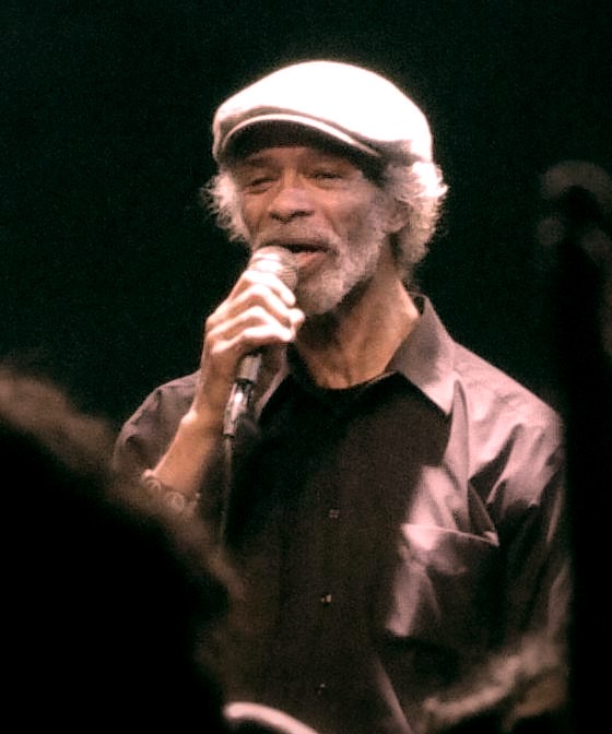 first rapper ever, Gil Scott Heron, performing on stage
