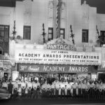 venue of the 31st academy awards ceremony with people standing in front